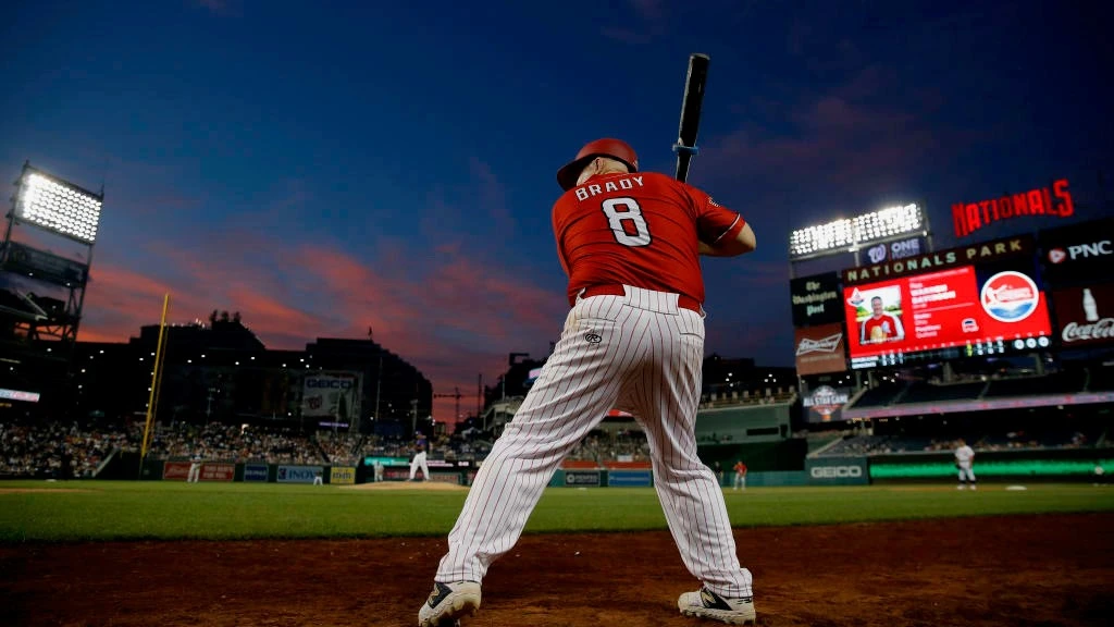 Congressman Brady at bat during the annual Congressional Baseball Game for Charity. He wears the Republican red jersey and helmet.
